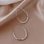 Ermania- Golden Ellipse Hoop Earrings - Ermania