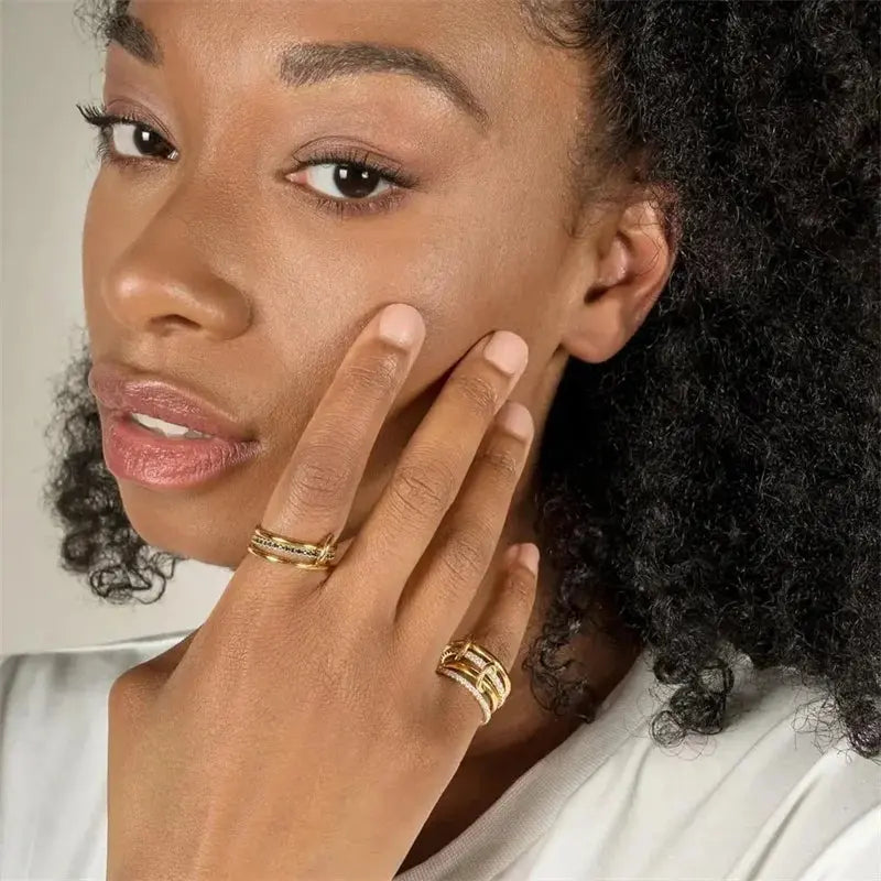 Ermania - A Two-Color Four-Ring Copper Jewelry Ring - Ermania